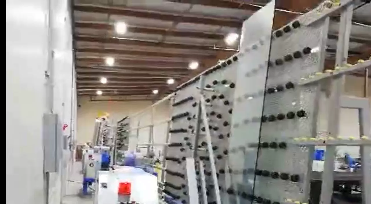 Línea recta de vidrio Hiseng línea de producción de la máquina de bordes en los EE. UU.